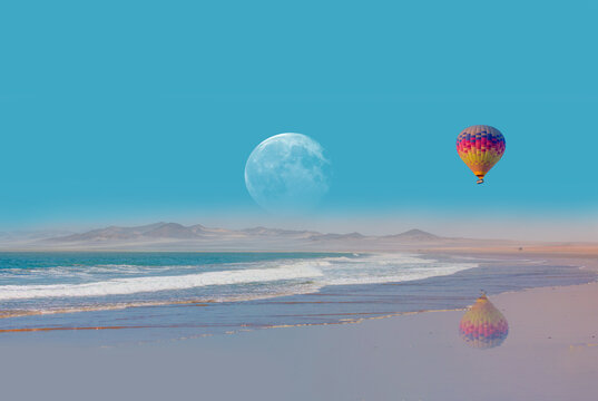 Hot air balloon flying over Namib desert with Atlantic ocean meets near Skeleton coast - Namibia, South Africa