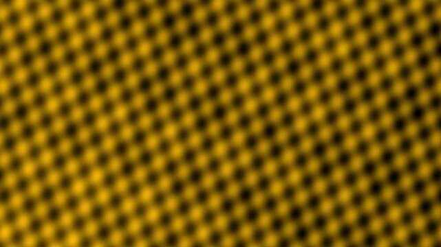 Abstract blurred yellow and black checkered pattern background with soft bokeh effect
