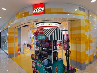 Fototapeta premium Shanghai,China-Dec.6th 2025: storefront facade and entry feature display of a LEGO store