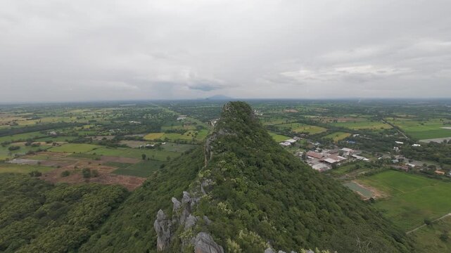 FPV flight along summit ridge of jagged Khao No mountain in Thailand