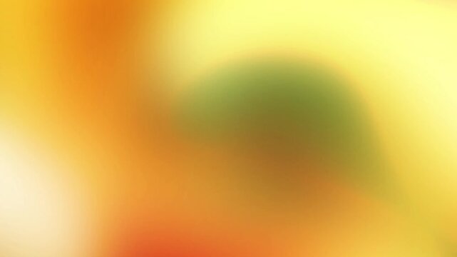 Warm amber yellow and golden orange gradient background loop with soft glowing particle light reflections Perfect for aesthetic video overlays and intros
