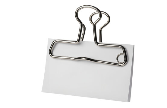Blank white sticky note with large silver binder clip isolated on transparent background, realistic paper texture, office stationery, minimal commercial PNG asset