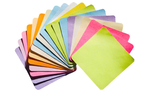 Colorful blank sticky notes arranged in a fan-shaped composition isolated on transparent background, vibrant stationery paper, office supplies, commercial PNG asset