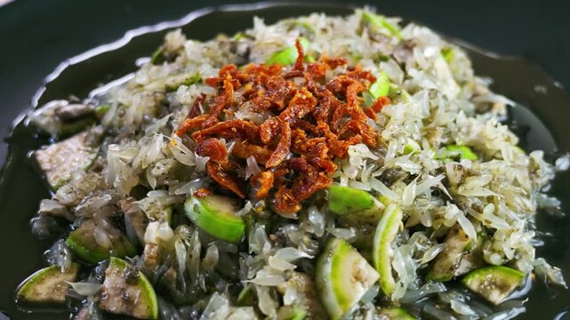 Slow Motion Rotating Shot of Spicy Northern Thai Pomelo Salad with Crab Paste