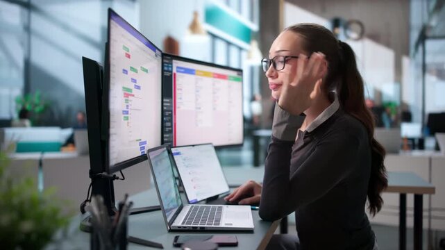Agile Project Manager Reviews Scrum Board Tasks