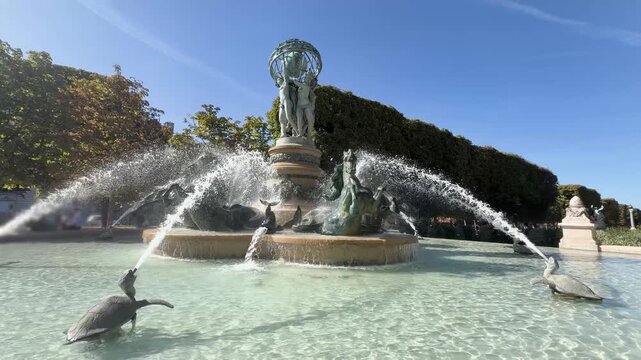 Bronze sea horses and celestial globe crown Carpeaux fountain, Paris
