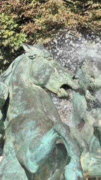 Bronze sea horses and celestial globe crown Carpeaux fountain, Paris
