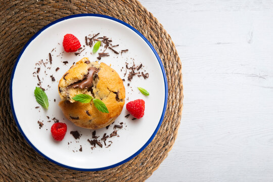 Top-down view of an American-style cookie filled with cocoa cream. Traditional Spanish recipe. 