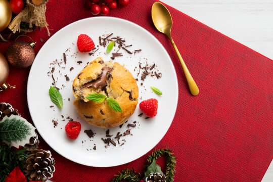Top-down view of an American-style cookie filled with cocoa cream. Traditional Spanish recipe. Christmas treat with festive decorations.
