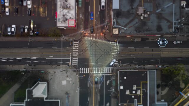 Futuristic self driving car navigating downtown streets at night with sensors, digital overlays and infographics visualizing real time data for safe, connected urban mobility