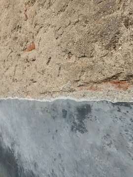 Rough Concrete Plaster and Weathered Brick Wall Texture