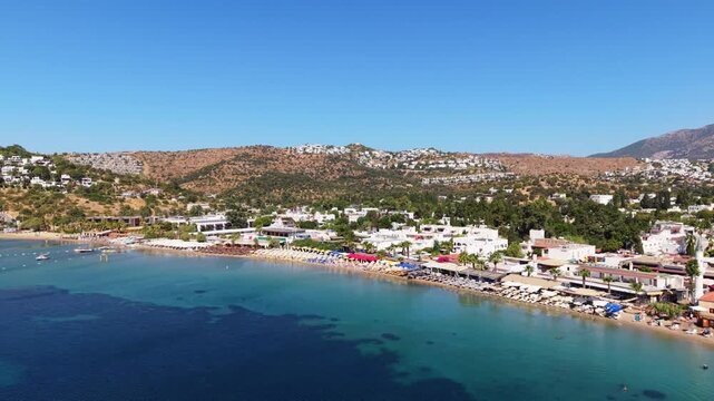 Drone panning low across the water in Bitez beach Bodrum