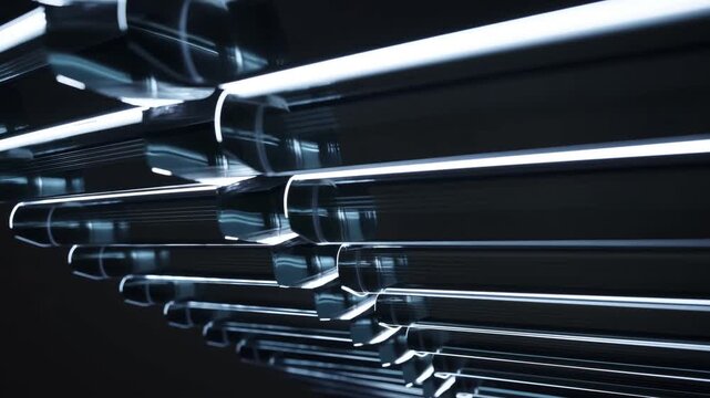 Stacked Industrial Metal Pipes in Dark Setting with Reflective Highlights