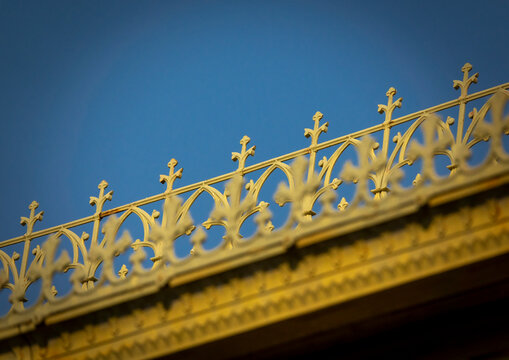 Fleur-de-lis cast-iron roof cresting stands out against a clear blue sky atop the Palacio de Ferro, Luanda Province, Luanda, Angola