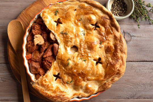 Beef steak and mushroom pie, family meat pie