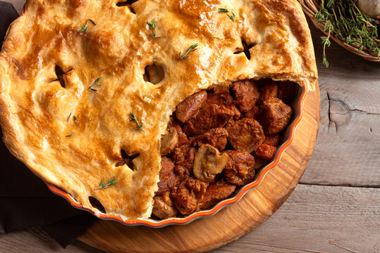 Beef steak and mushroom pie, family meat pie