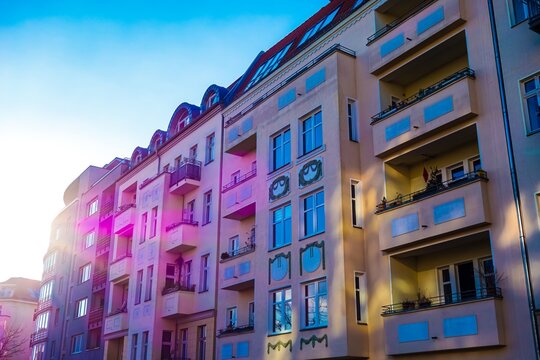 Apartment building with balconies and dormer windows