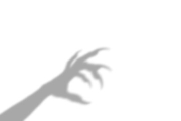 A creepy shadow of a long clawed monster hand reaching out from the corner of the frame presented as an isolated on transparent background © AHAMMED