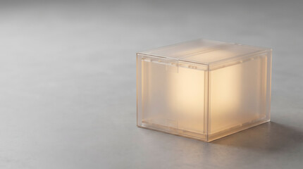 Fototapeta premium Corrugated shipping box made of frosted translucent material glowing from within, conceptual transparent logistics.