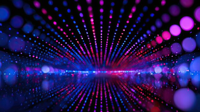 Infinite tunnel of glowing colorful lights receding into darkness