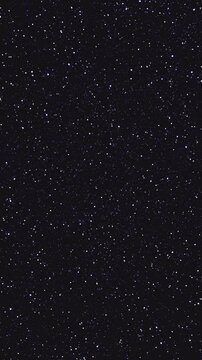 Abstract dark shimmer with fine particle sparkle. Abstract dark shimmering surface glows with smooth twinkling and fine particle sparkle. 