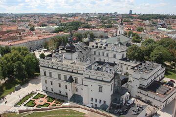 Fototapeta premium Panoramic view of Vilnius Old Town and the Royal Palace from Gediminas Tower window, Lithuania travel concept