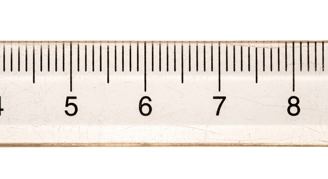 Close-up view of a transparent plastic ruler with clear measurement markings and numbers