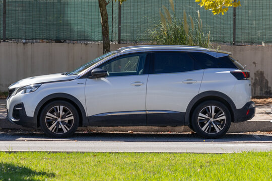 White peugeot 3008 suv parked outdoors on street