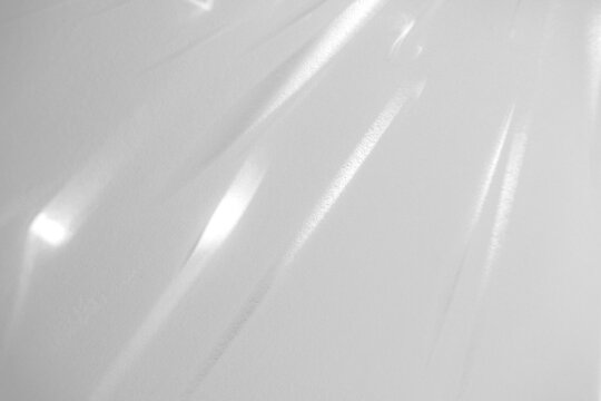 Real broad water caustic shadow cut out on a transparent png background with soft diffused edges. Anchors a luxury cosmetic and fashion design as a png overlay with liquid light effects.
