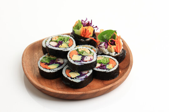 Kimbap Korean Roll Rice with Various FIlling, on Wooden Plate