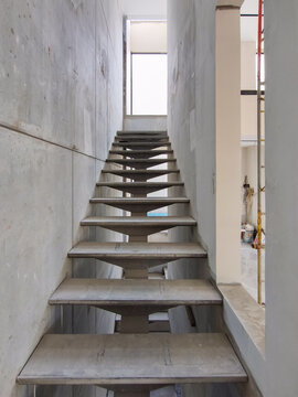 Jakarta, Indonesia  August 28 2026 Minimalist steel staircase under construction on second floor of house