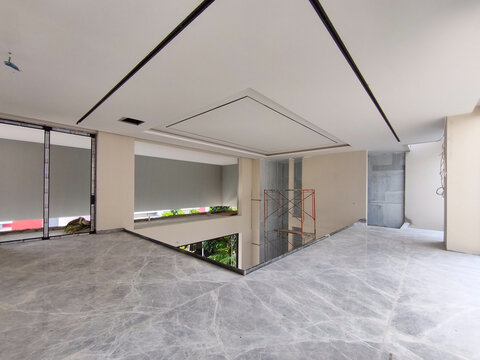 Jakarta, Indonesia  August 28 2026 Second floor interior of modern house with grey marble flooring and drop ceiling details