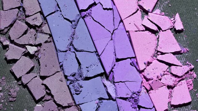 Colorful abstract background of eye shadow powder, slow rotation