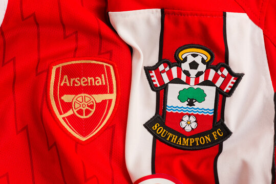 Kyiv, Ukraine. September 11, 2026. Arsenal and Southampton FC football club crests displayed side by side on red team jerseys