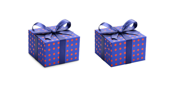 Two blue gift wrapped presents with red metallic spots with navy blue ribbon bows, one with a shadow, one without isolated against a transparent background