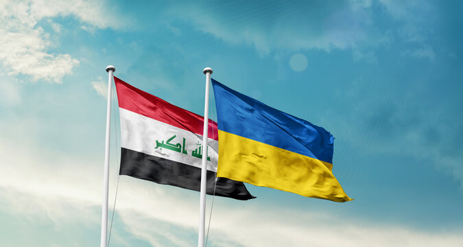 Iraq Ukraine friendship flags are waving in the sky. Two country flag for agreement or deal. Iraq Ukraine national flag for commitment.