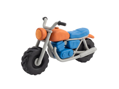 Vibrant clay motorcycle craft model sitting on transparent background