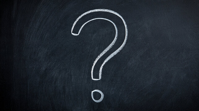 A white chalk question mark drawn on a black chalkboard background. Ideal for education, Q&A, and decision-making concepts.