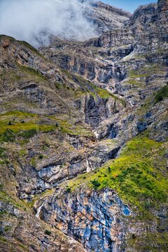French Pyrenees dramatic mountain landscape. Cirque de Gavarnie mountain valley in Pyrenees National Park (French: Parc national des Pyrenees).