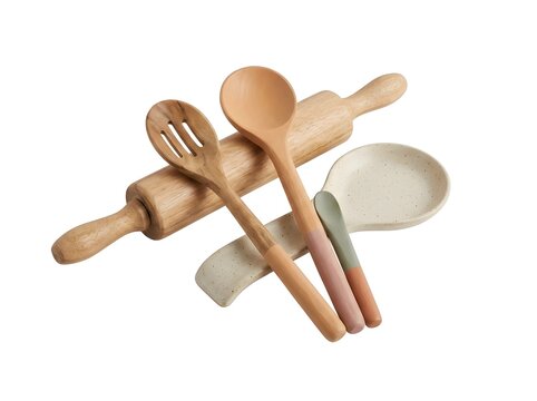 Wooden kitchen utensils and rolling pin on white background
