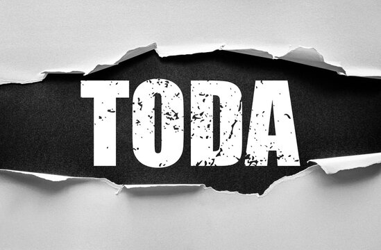 Torn paper reveals bold distressed word TODA on textured background. Hebrew thank you message expressing gratitude, appreciation, and acknowledgment in a modern creative typographic design concept