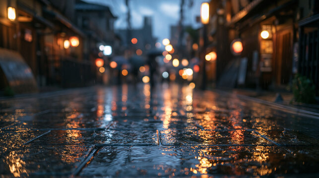Wet Cobblestone Street Reflecting City Lights on Rainy Night