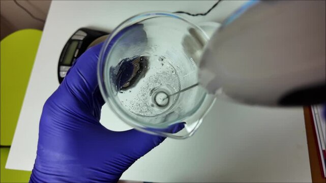 Mixing Liquid in a Glass Beaker With Magnetic Stirrer