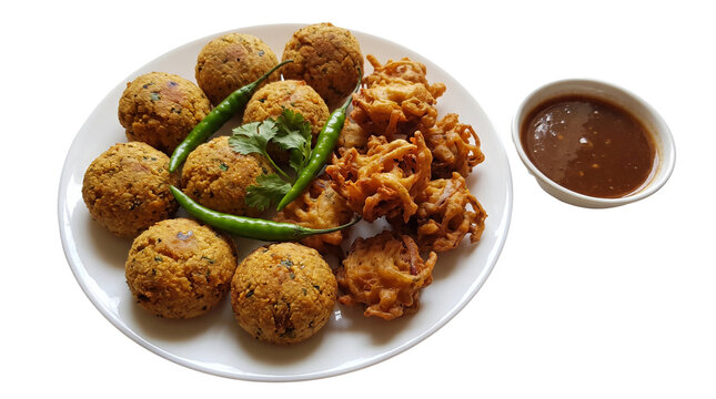 Crispy Posto Bora and Piyaji (onion pakora) combo on a porcelain dish transparent background