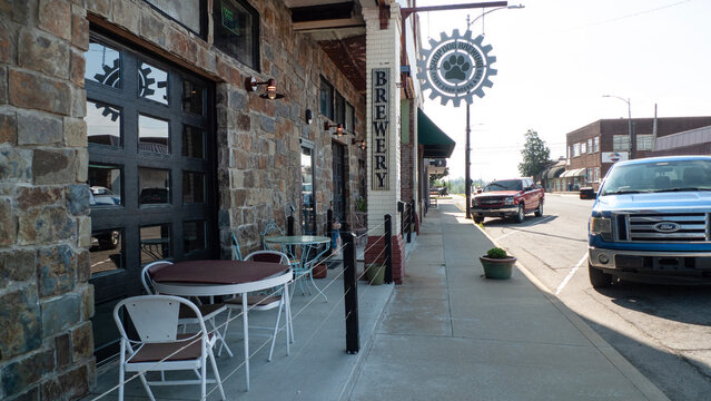 March 30, 2026, Poteau, Oklahoma, downtown district brewery with outdoor seating along the sidewalk.