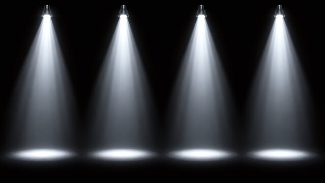 Four bright white spotlights shining down in a row creating a dramatic stage lighting effect against a completely dark background