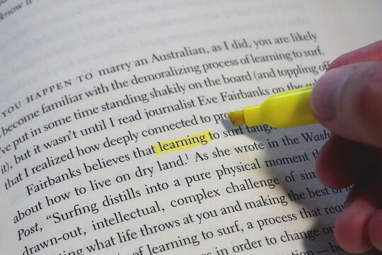 Learning word highlighted in a book page.