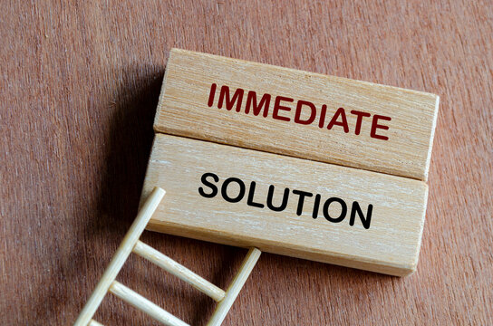 Wooden blocks representing an immediate solution to urgent problems and challenges.