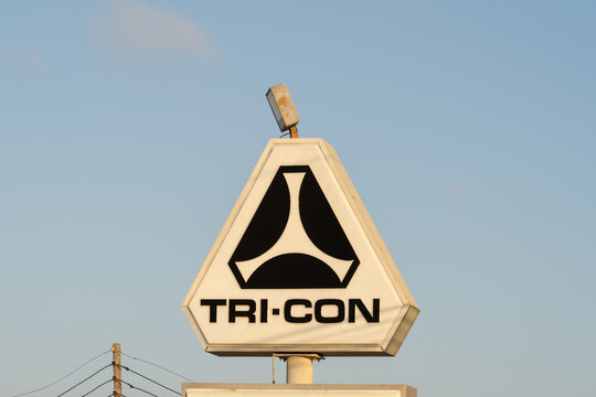 Freeport, TX, USA - March 5, 2022: Closeup logo for TRI CON Construction Co against blue sky background. Freeport, TX, USA. TRI CON is a general contractor in the petrochemical construction market wit