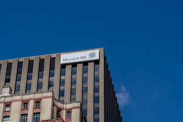Obraz premium Toronto, Canada - September 7, 2026: Munich Re sign on the head office building in downtown Toronto, Canada. Munich Re Group is a reinsurance company based in Germany.